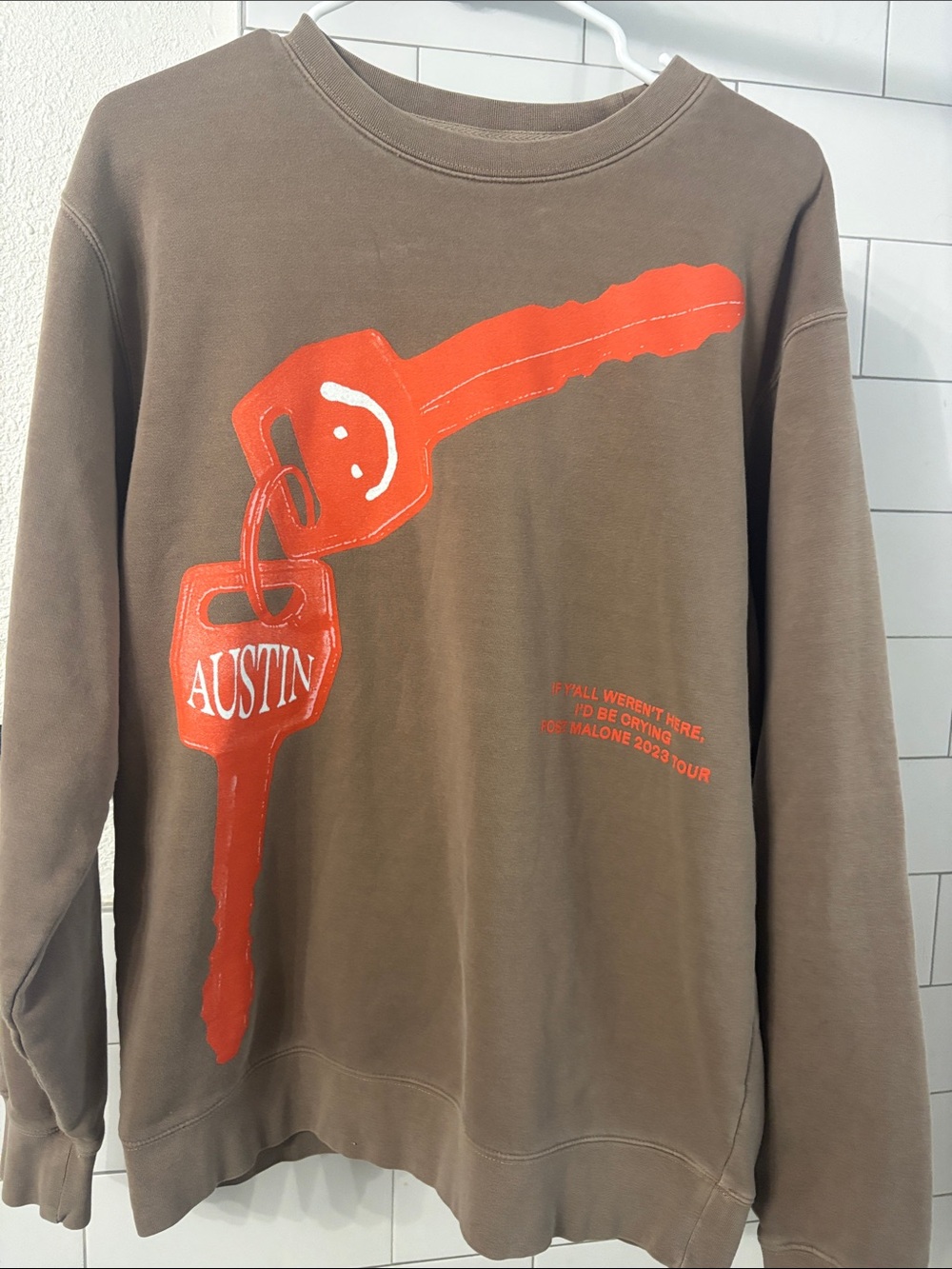 Men's Brown Crewneck Sweatshirt with Orange Key Graphic